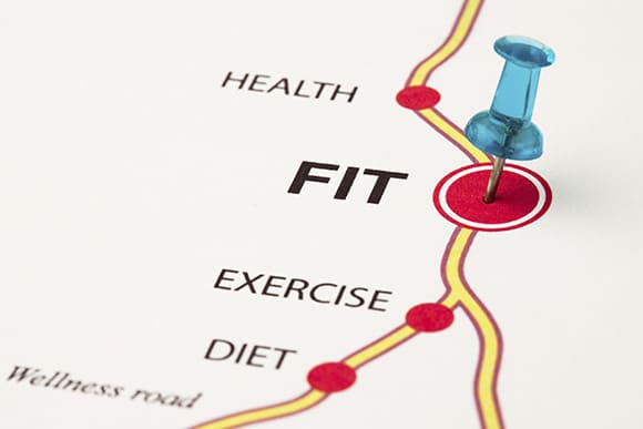 A thumbtack pinpointing a location on a fitness map